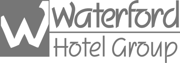 Logo for Waterford Hotel Group featuring a large stylized W next to the company name in bold, modern lettering.